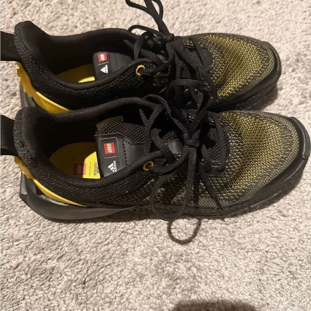 LEGOS ADITION Adidas Black and Yellow Tennis Shoes